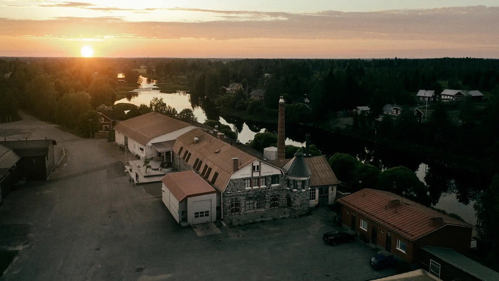 Kyrö Distillery Company located in Isokyrö, Finland. Pictured from above in a sunset.